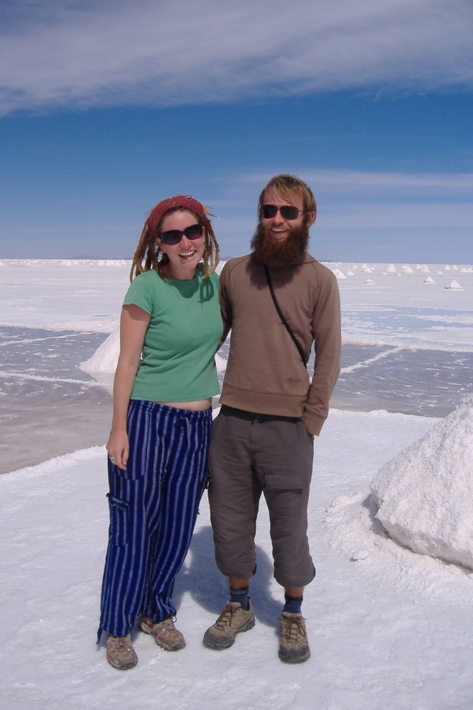 Backpackers on salt plains Bolivia